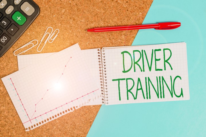 Handwriting text writing Driver Training. Concept meaning course of study that teaches how to drive a vehicle Desk notebook paper office cardboard paperboard study supplies table chart.