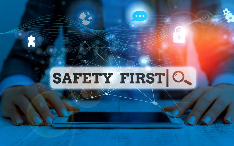 Conceptual hand writing showing Safety First. Business photo showcasing used to say that the most important thing is to be safe Picture photo network scheme with modern smart device.